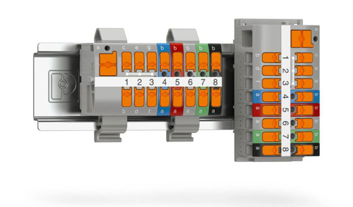 Multiposition straight-through module with two connection points